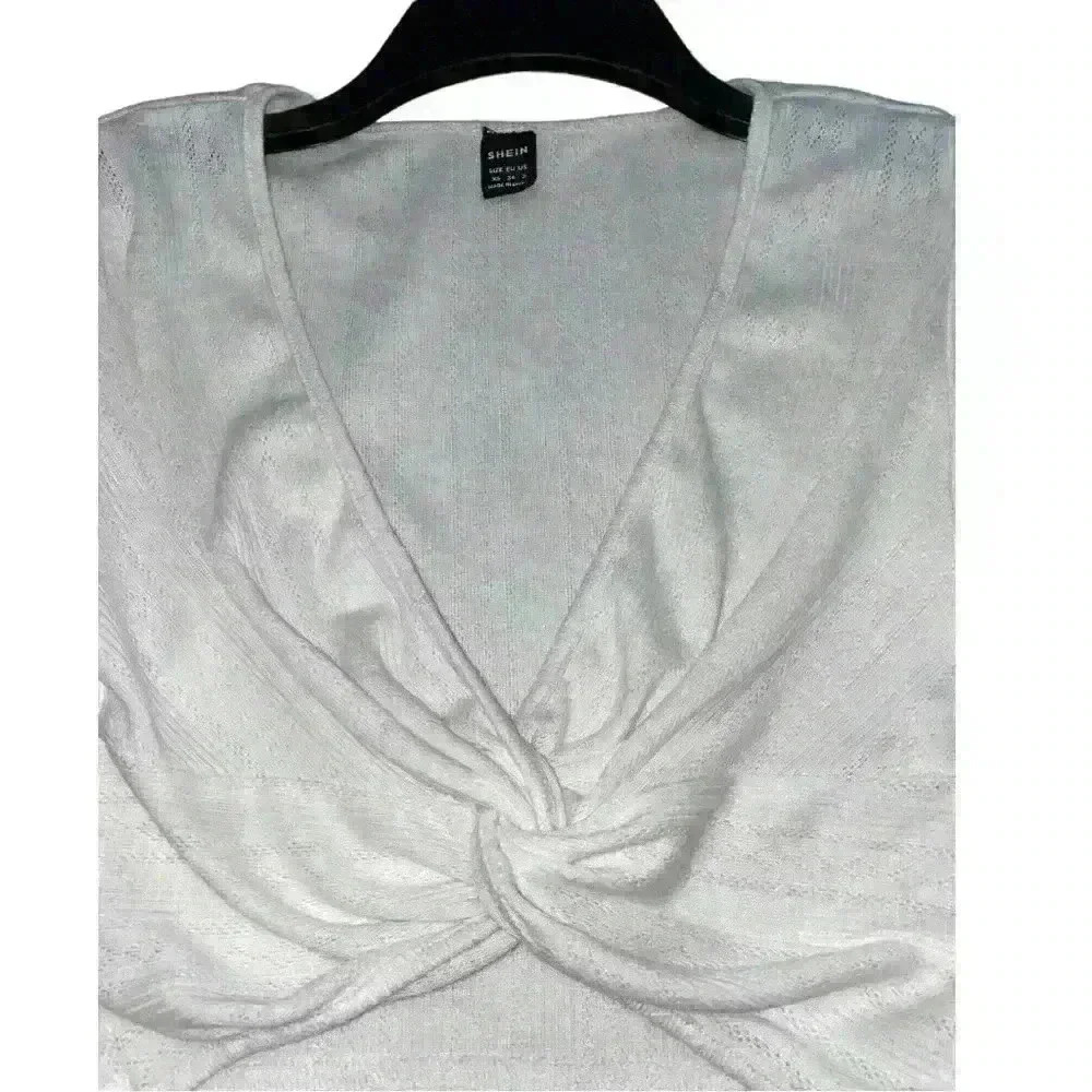 White ruffle sleeve crop top
By Shein Size: XS - Picture 5 of 5